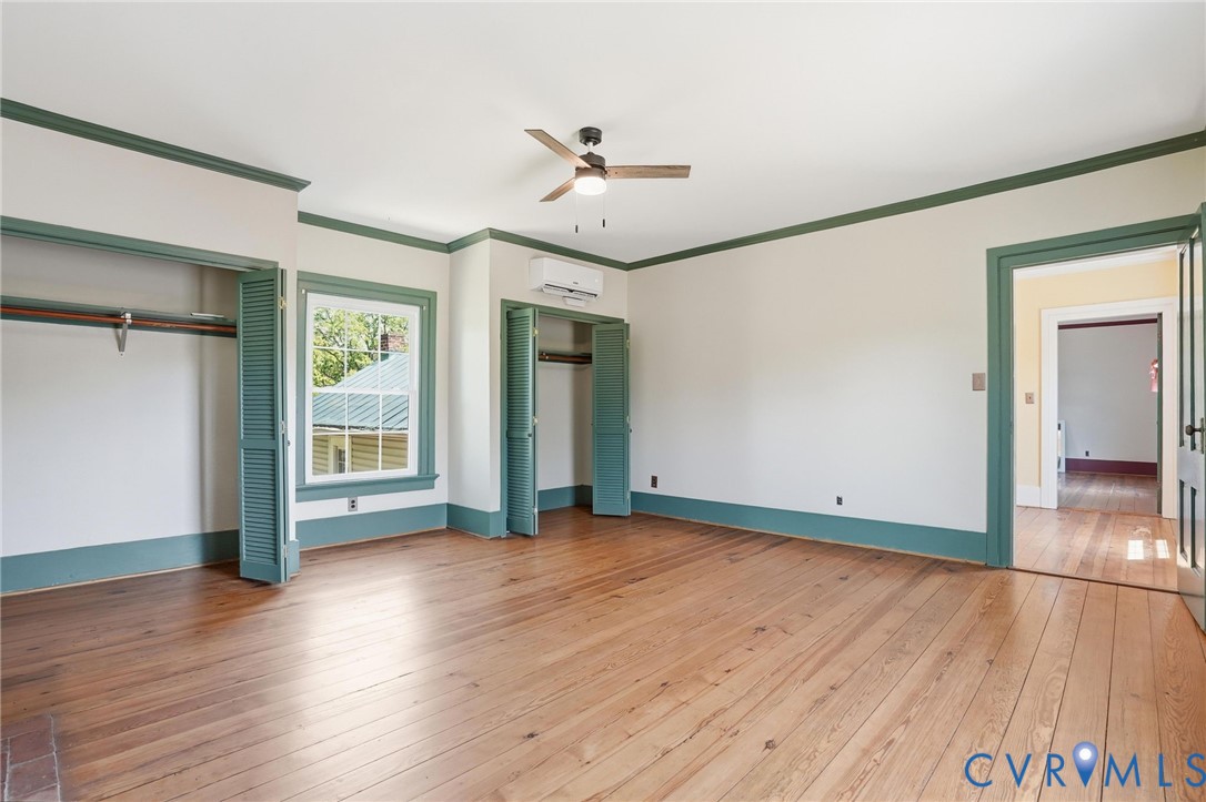 2297 Indian Oak Road Crewe, VA 23930 - Photo 30 of 53 a view of an empty room with wooden floor and a window