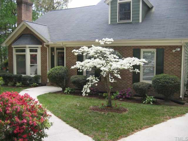 7509 Boscobel Way Raleigh, NC 27615 - Photo 1 of 1 a front view of a house with garden