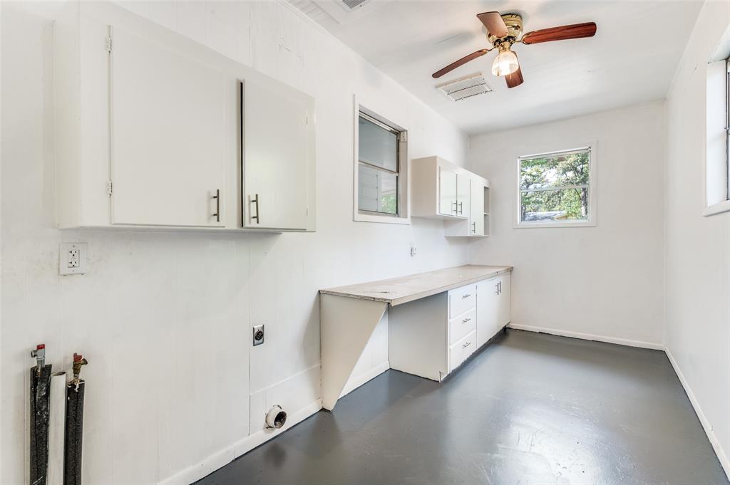 529 Roberts Cut Off Road River Oaks, TX 76114 - Photo 11 of 12 Washroom with finished concrete floors, electric dryer hookup, cabinet space, and ceiling fan
