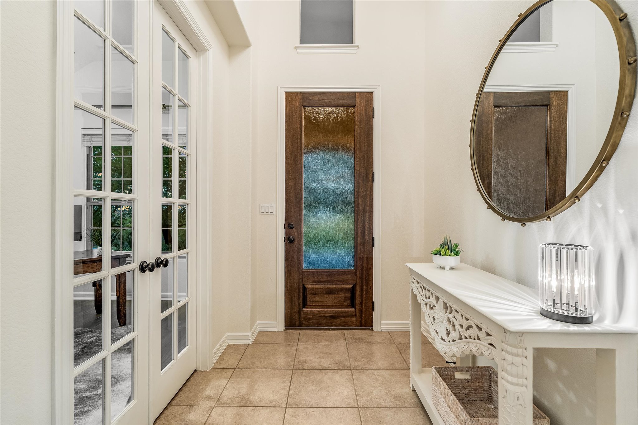 226 Galloway Lane Austin, TX 78737 - Photo 6 of 30 Foyer with light tile patterned floors and french doors
