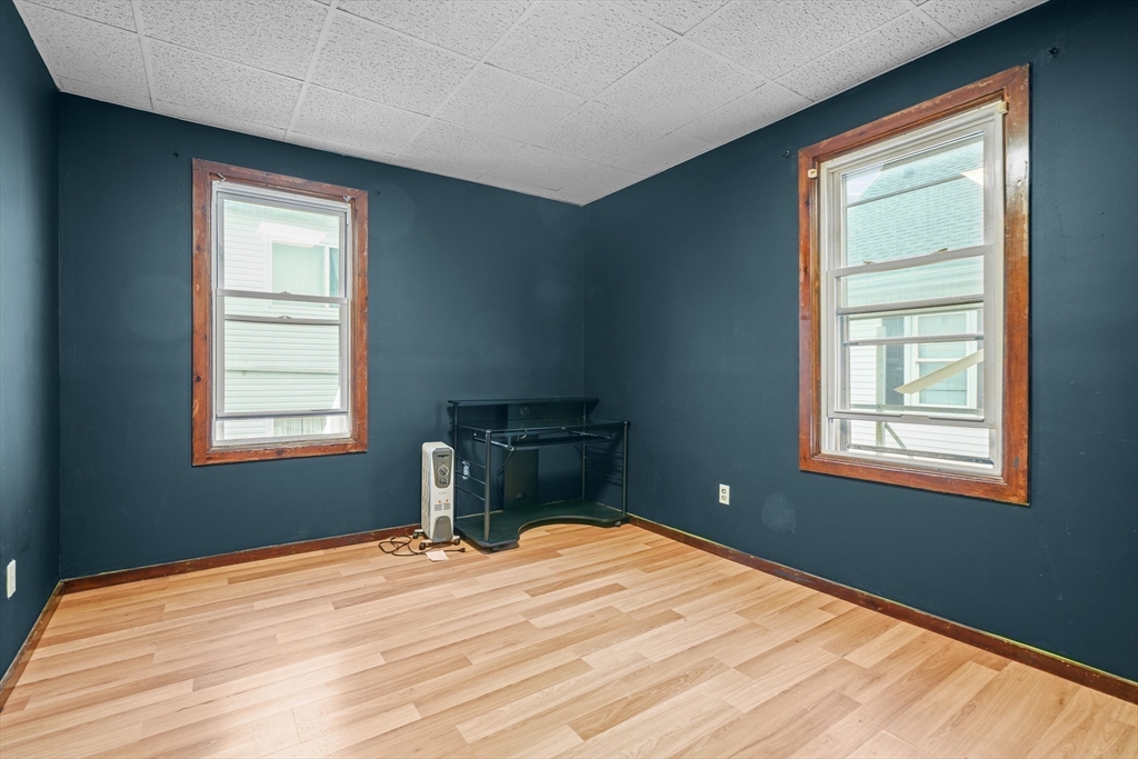 337 Columbia Street Fall River, MA 02721 - Photo 26 of 33 a bedroom with a bed and a window