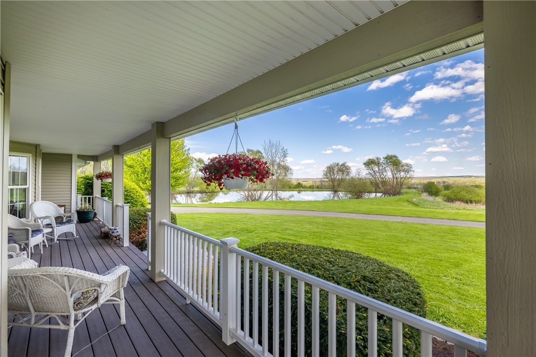 4128 River Road York, NY 14533 - Photo 15 of 50 COVERED FRONT & WRAP AROUND PORCH WITH POND VIEWS