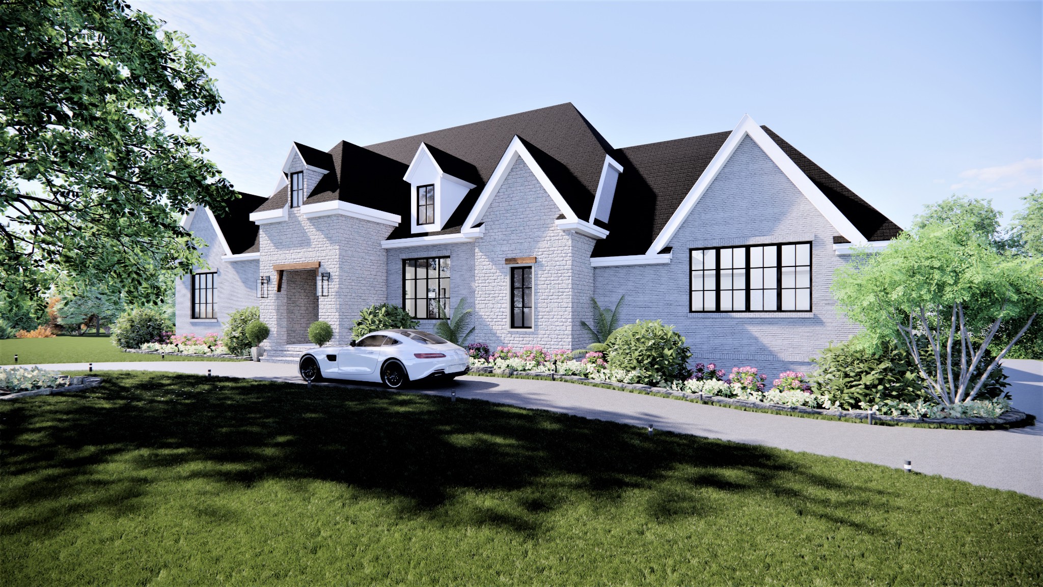 a front view of a house with a garden and yard