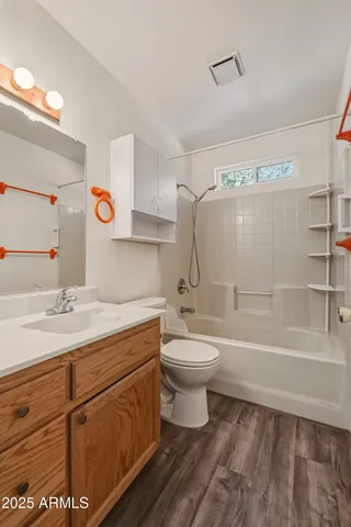 a bathroom with a sink a toilet and a bathtub