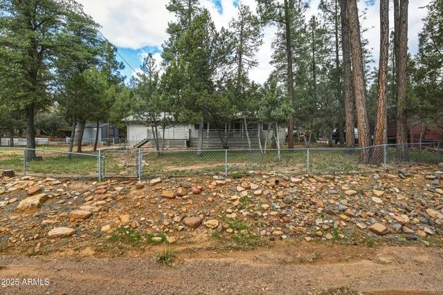 a picture of a bathroom with a shower