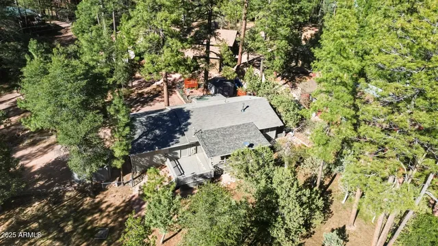 an aerial view of residential house with outdoor space