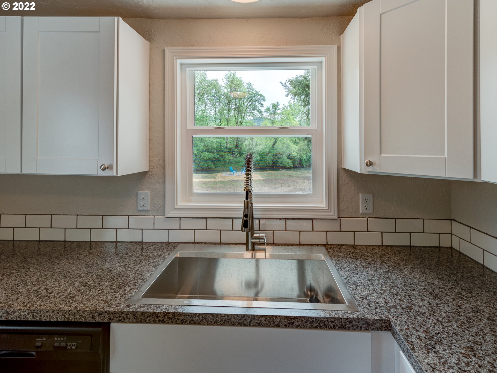 92143 Marcola Road Marcola, OR 97454 - Photo 11 of 27 a kitchen with granite countertop a sink and a window