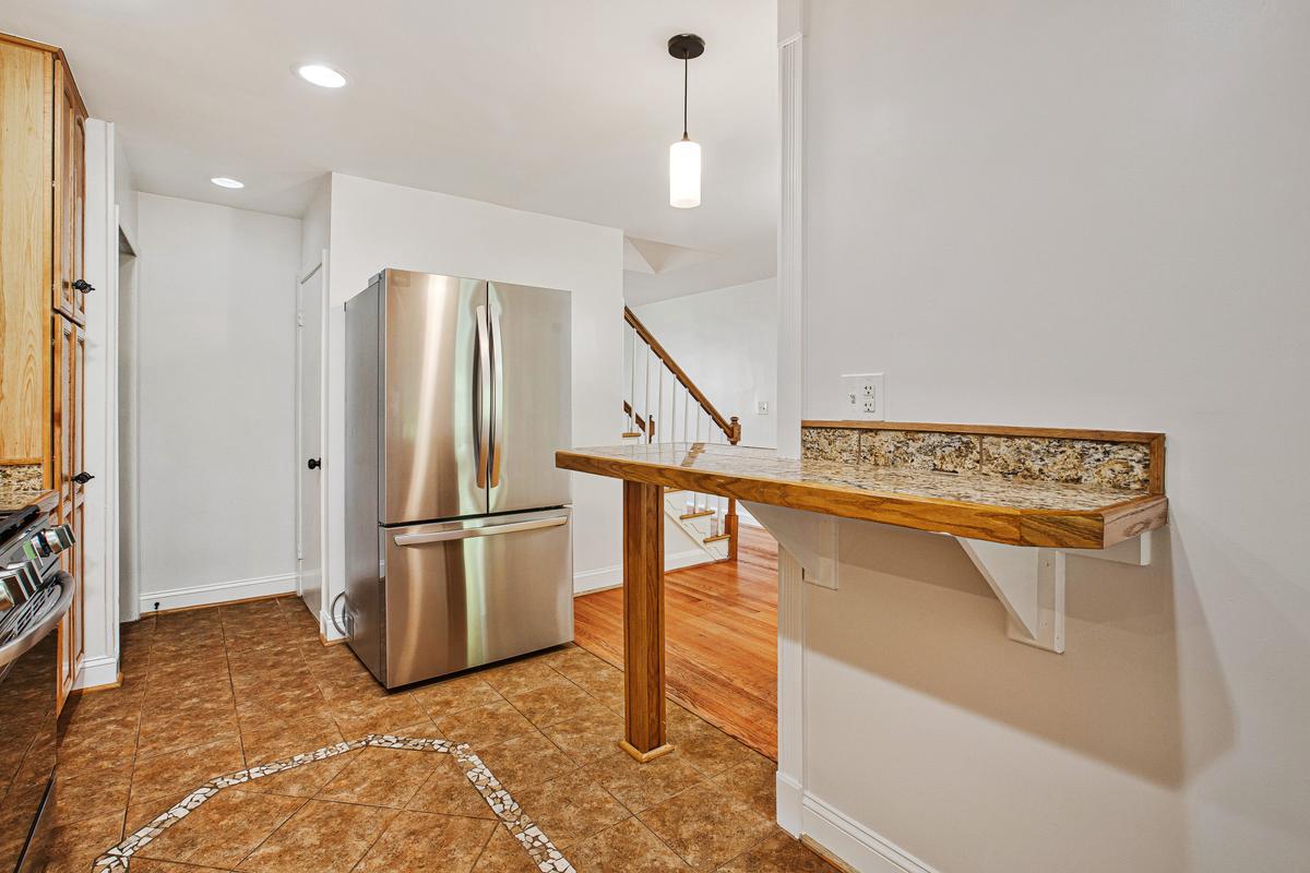1016 Winsford Road Towson, MD 21204 - Photo 13 of 42 a view of a kitchen with a sink