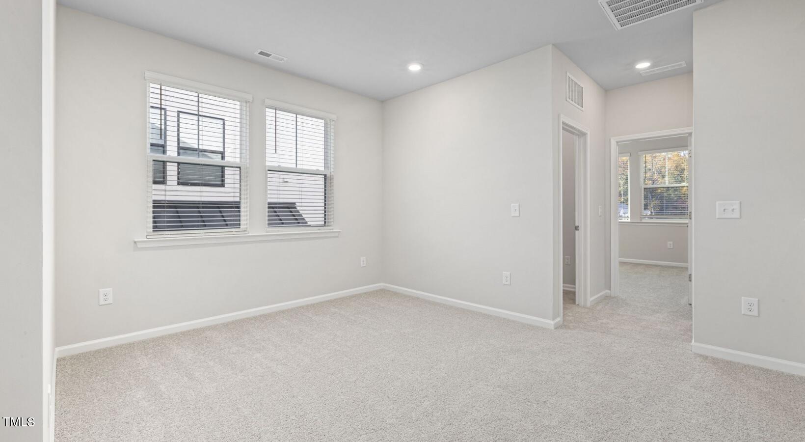 3709 Nova Star Lane, Unit GARRISON Raleigh, NC 27612 - Photo 15 of 30 an empty room with windows