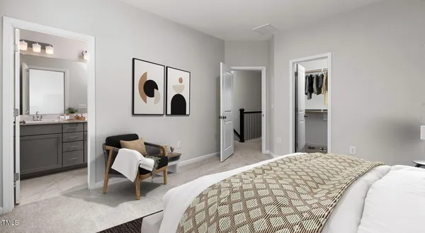 a bedroom with a bed and furniture