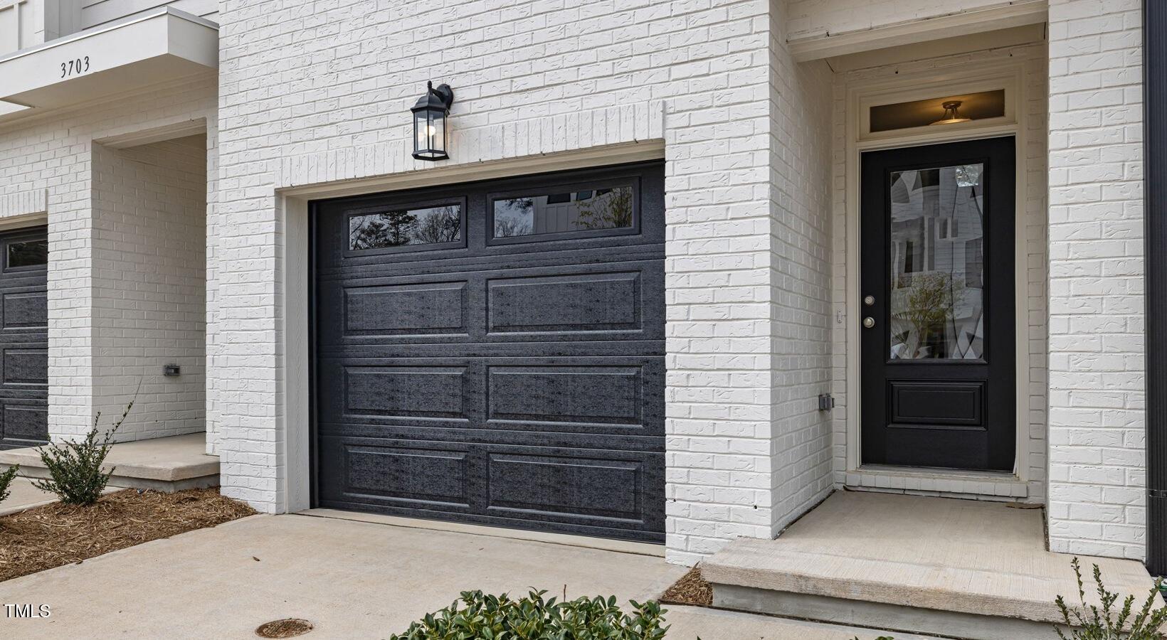 3709 Nova Star Lane, Unit GARRISON Raleigh, NC 27612 - Photo 2 of 30 a front view of a house