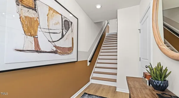 a view of a entryway with wooden floor