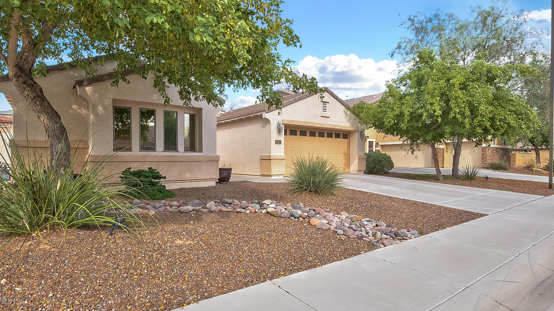 2610 East Ridge Creek Road Phoenix, AZ 85024 - Photo 2 of 26 Decorative, easy-care front yard