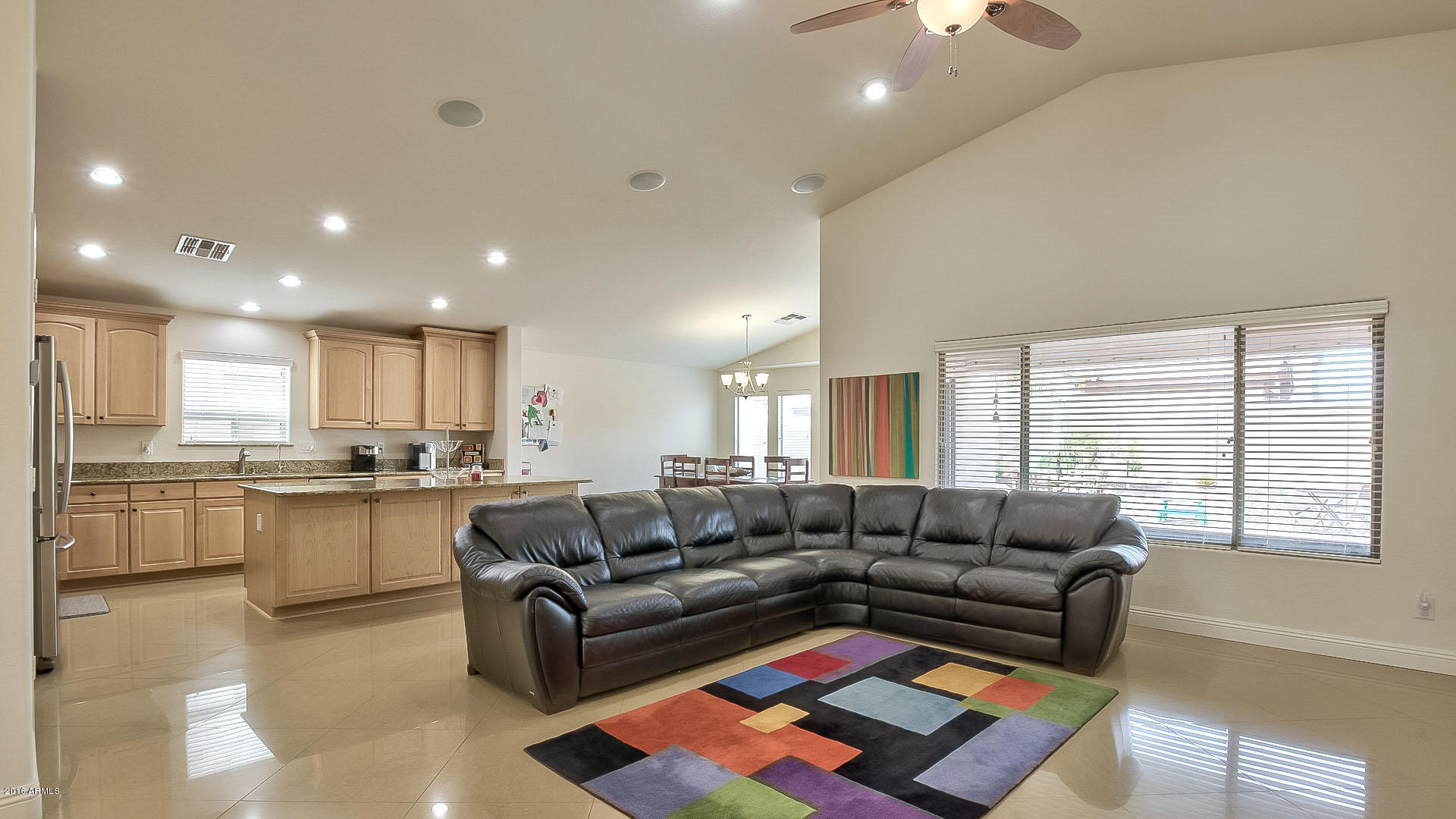 2610 East Ridge Creek Road Phoenix, AZ 85024 - Photo 6 of 26 Living room opens to kitchen