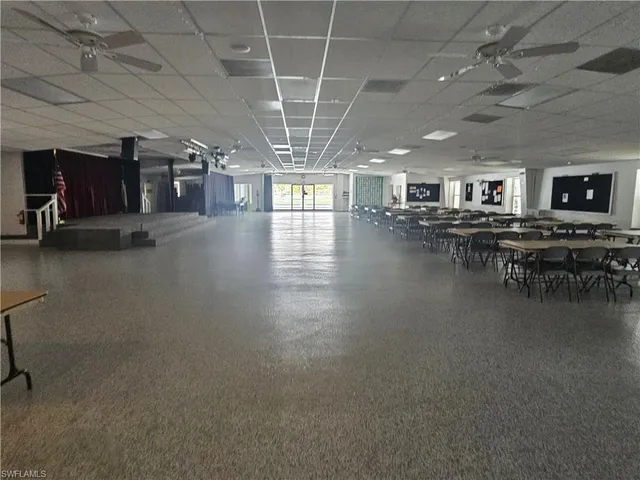 a view of a hall with dining room