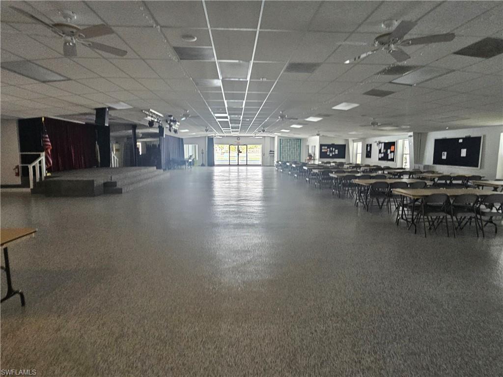 38 Turquoise Avenue, Unit 38T Naples, FL 34114 - Photo 27 of 29 a view of a hall with dining room