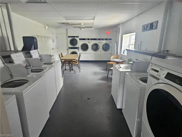 a room with furniture and a large window