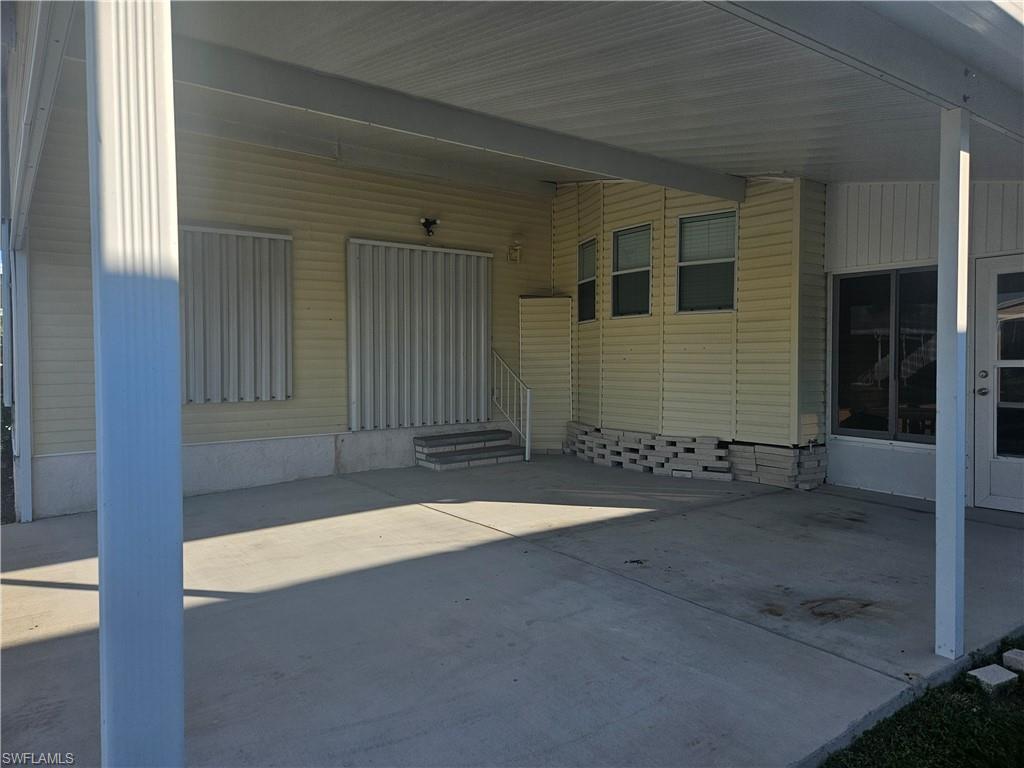 38 Turquoise Avenue, Unit 38T Naples, FL 34114 - Photo 3 of 29 a backyard of a house