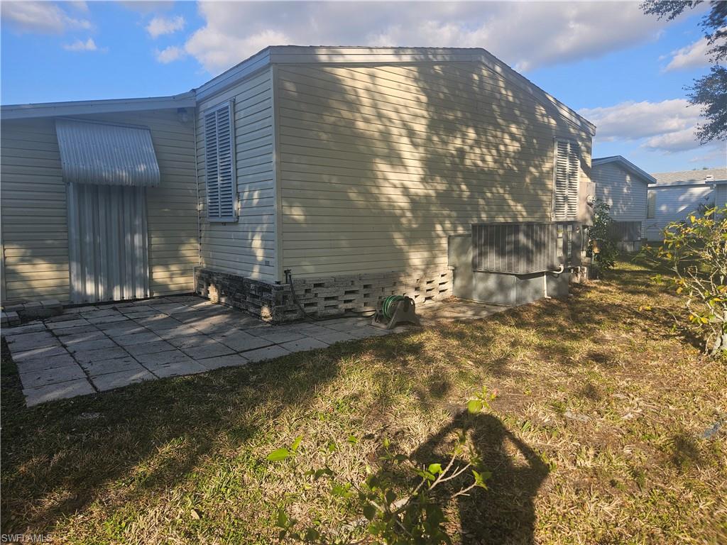 38 Turquoise Avenue, Unit 38T Naples, FL 34114 - Photo 4 of 29 a view of a yard