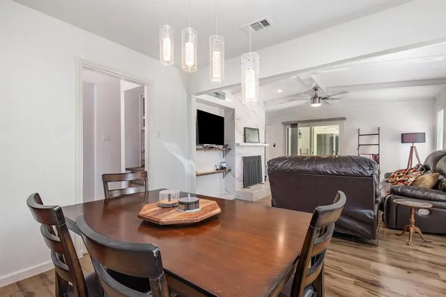 a view of a dining room with furniture