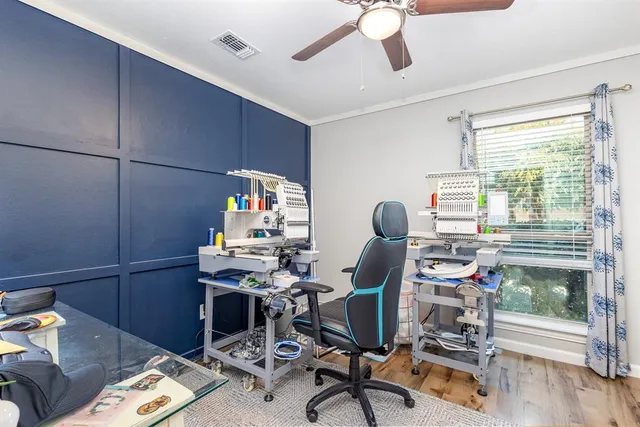 a workspace with furniture and a window