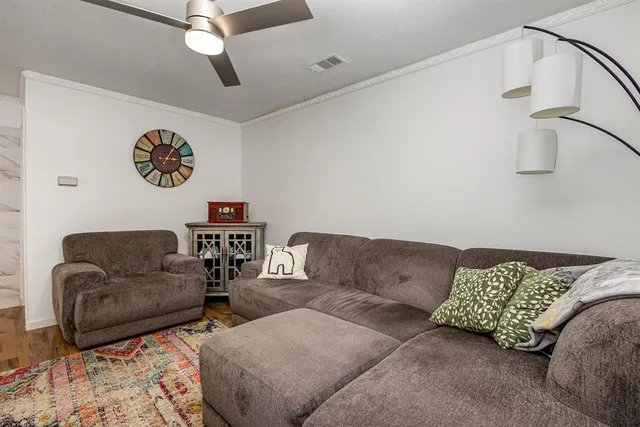 a living room with furniture and a couch
