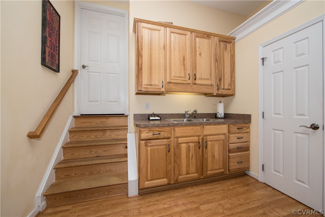 4625 Treely Road Chester, VA 23831 - Photo 13 of 50 a kitchen with white cabinets and sink