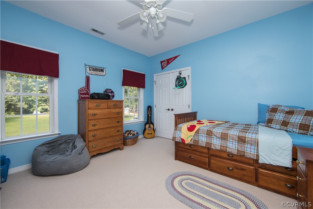 4625 Treely Road Chester, VA 23831 - Photo 16 of 50 a bedroom with furniture and a window