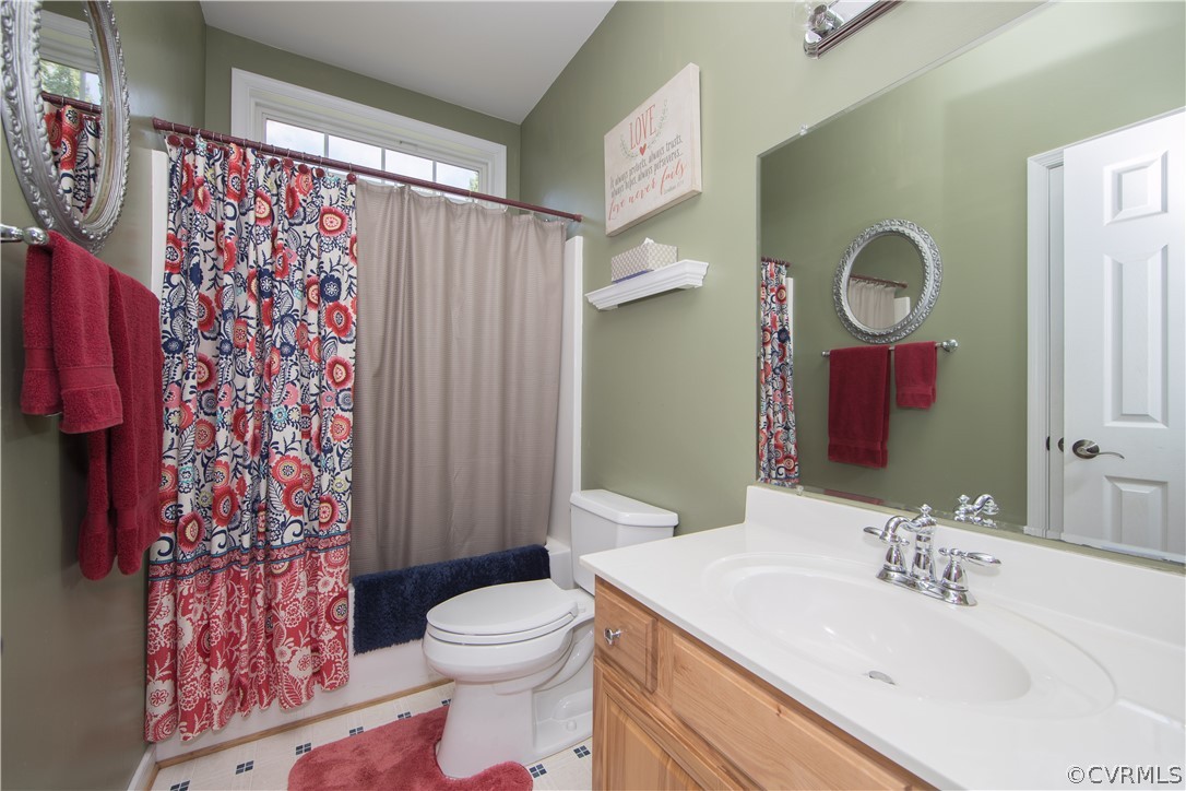4625 Treely Road Chester, VA 23831 - Photo 17 of 50 a bathroom with a sink toilet and shower