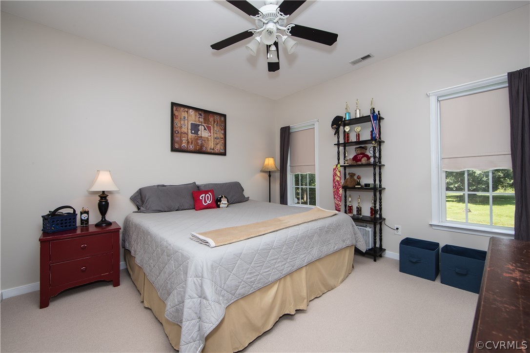 4625 Treely Road Chester, VA 23831 - Photo 18 of 50 a bedroom with a bed and a window