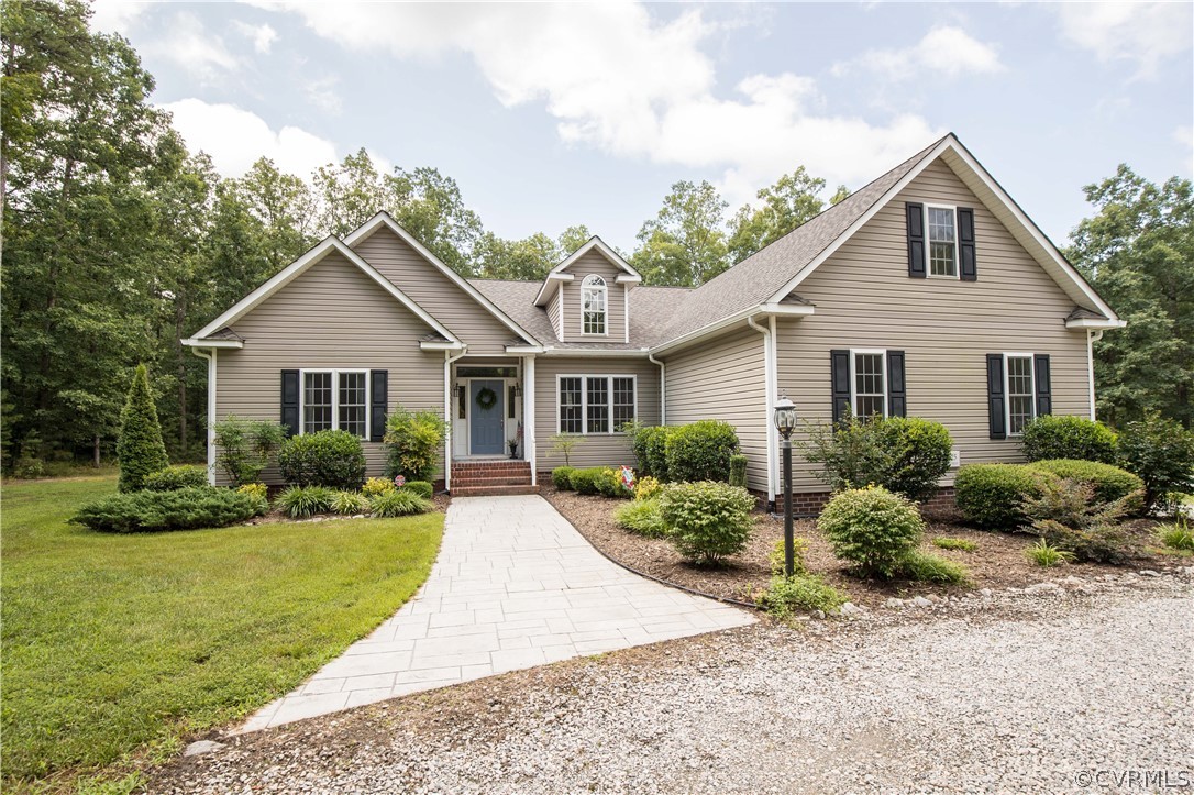 4625 Treely Road Chester, VA 23831 - Photo 2 of 50 a front view of a house with a yard