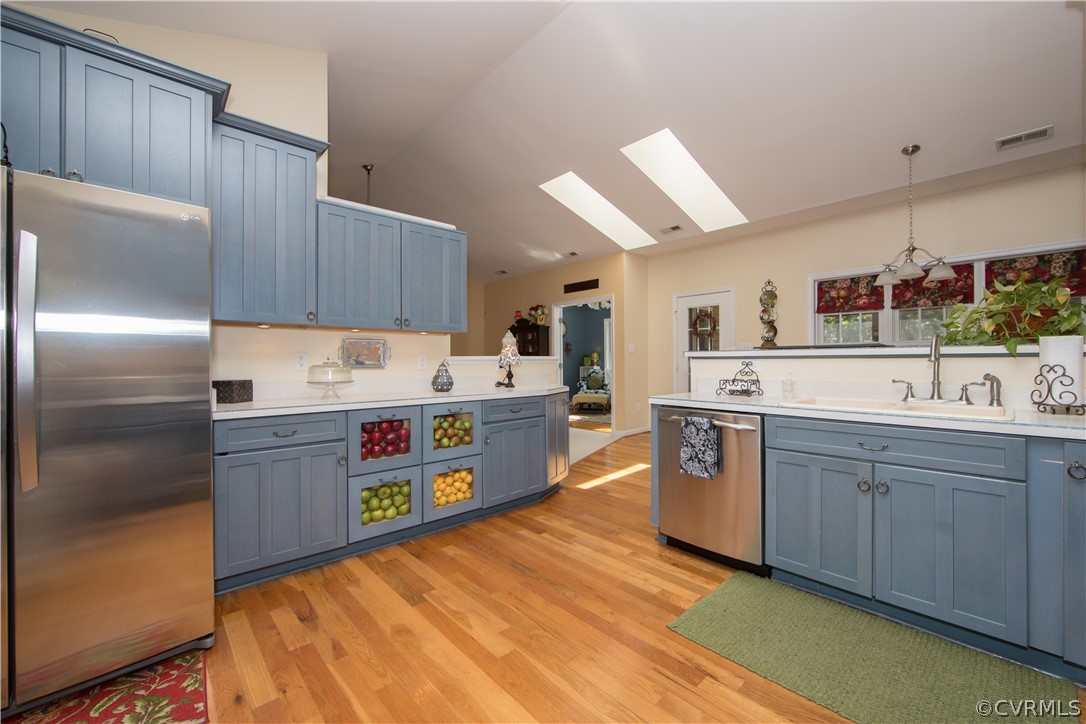 4625 Treely Road Chester, VA 23831 - Photo 28 of 50 a kitchen with stainless steel appliances granite countertop a refrigerator sink and cabinets