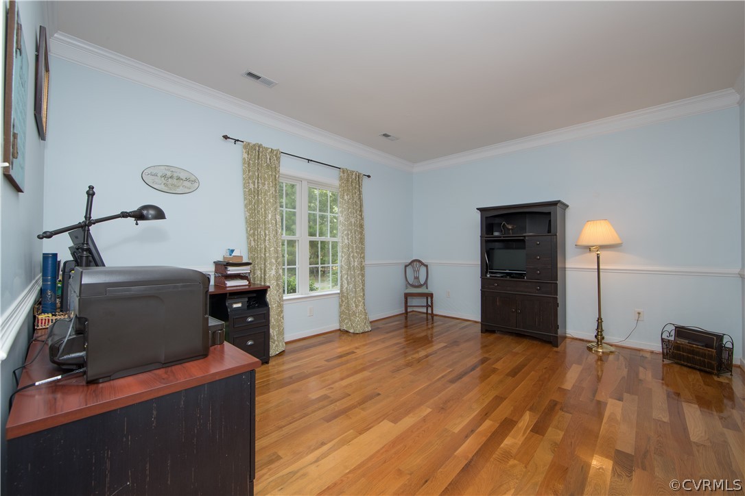 4625 Treely Road Chester, VA 23831 - Photo 31 of 50 a view of a workspace with furniture and a window