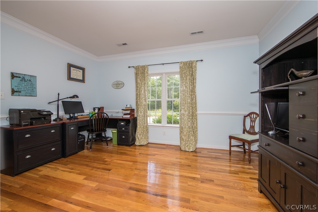 4625 Treely Road Chester, VA 23831 - Photo 32 of 50 a bedroom with a bed and wooden floor