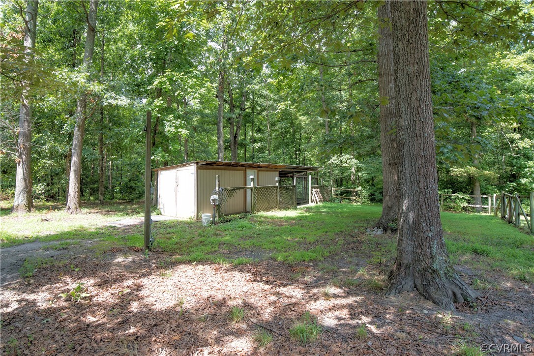 4625 Treely Road Chester, VA 23831 - Photo 4 of 50 a view of a house with backyard and garden
