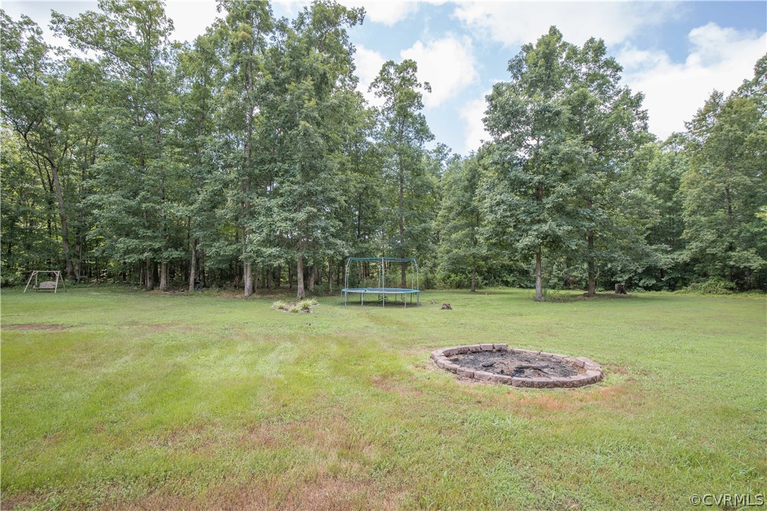 4625 Treely Road Chester, VA 23831 - Photo 6 of 50 a view of a backyard with a trees