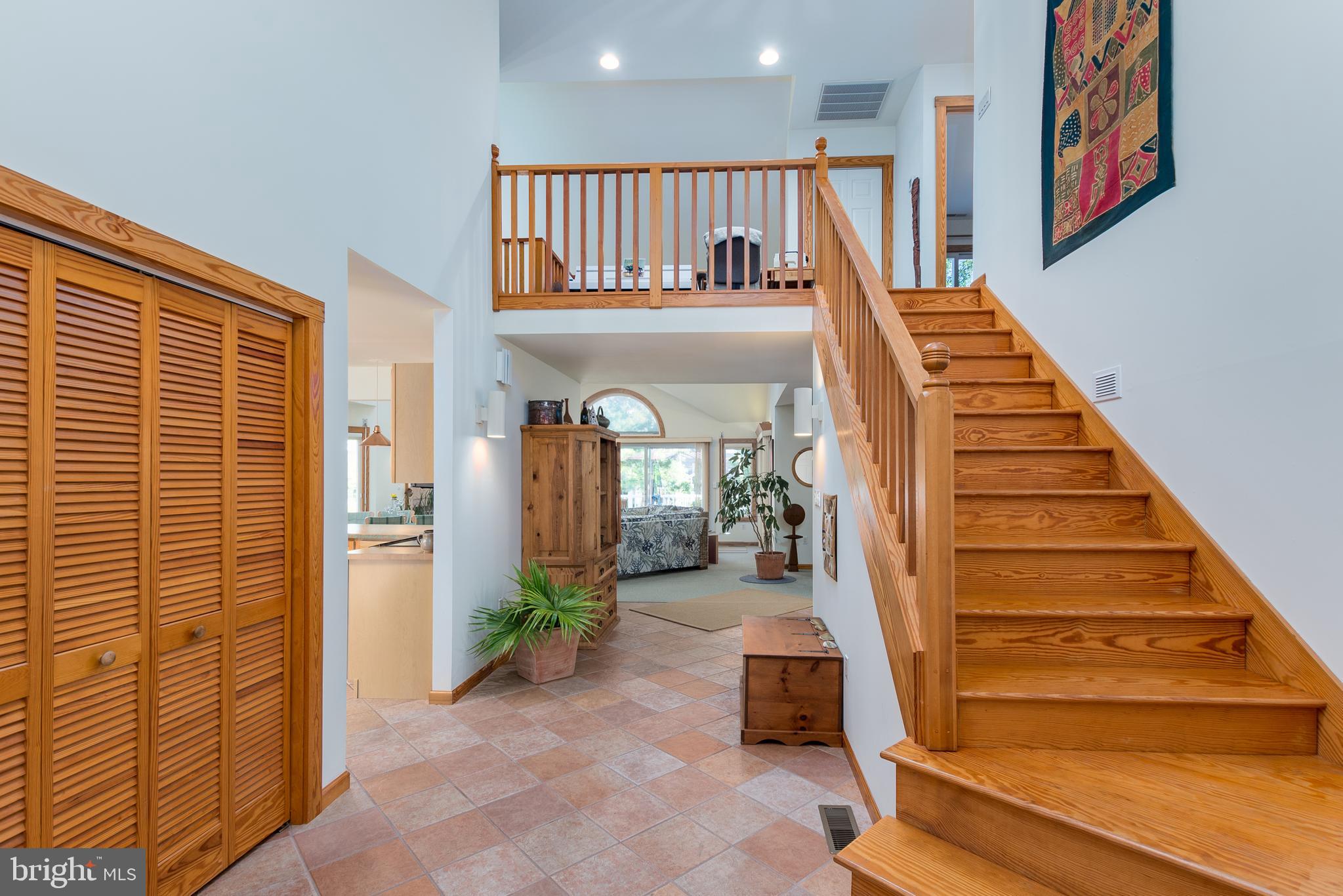 533 Bethany Loop Bethany Beach, DE 19930 - Photo 12 of 44 Gracious foyer with staircase to upper level