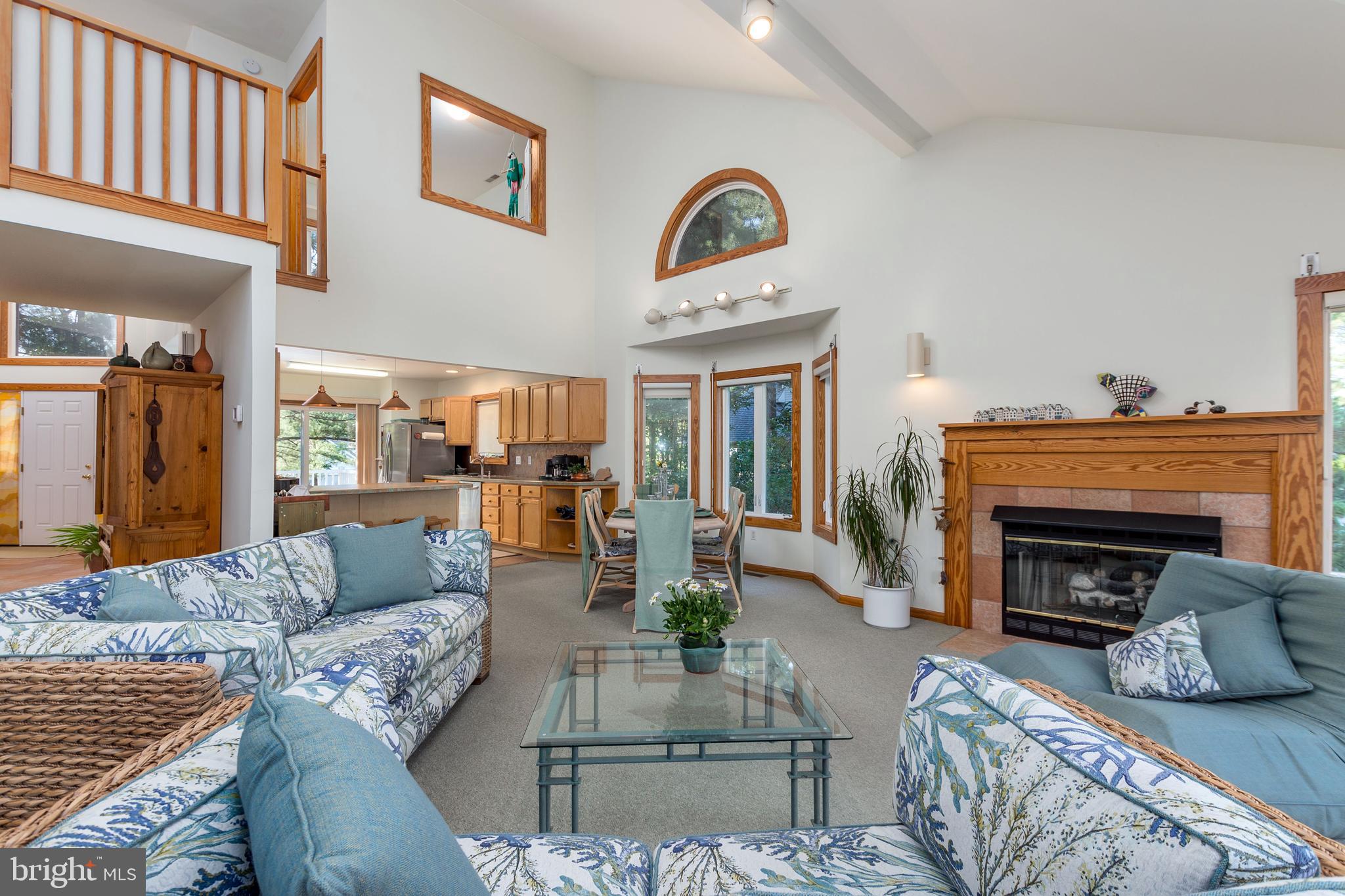 533 Bethany Loop Bethany Beach, DE 19930 - Photo 13 of 44 Great room with gas fireplace