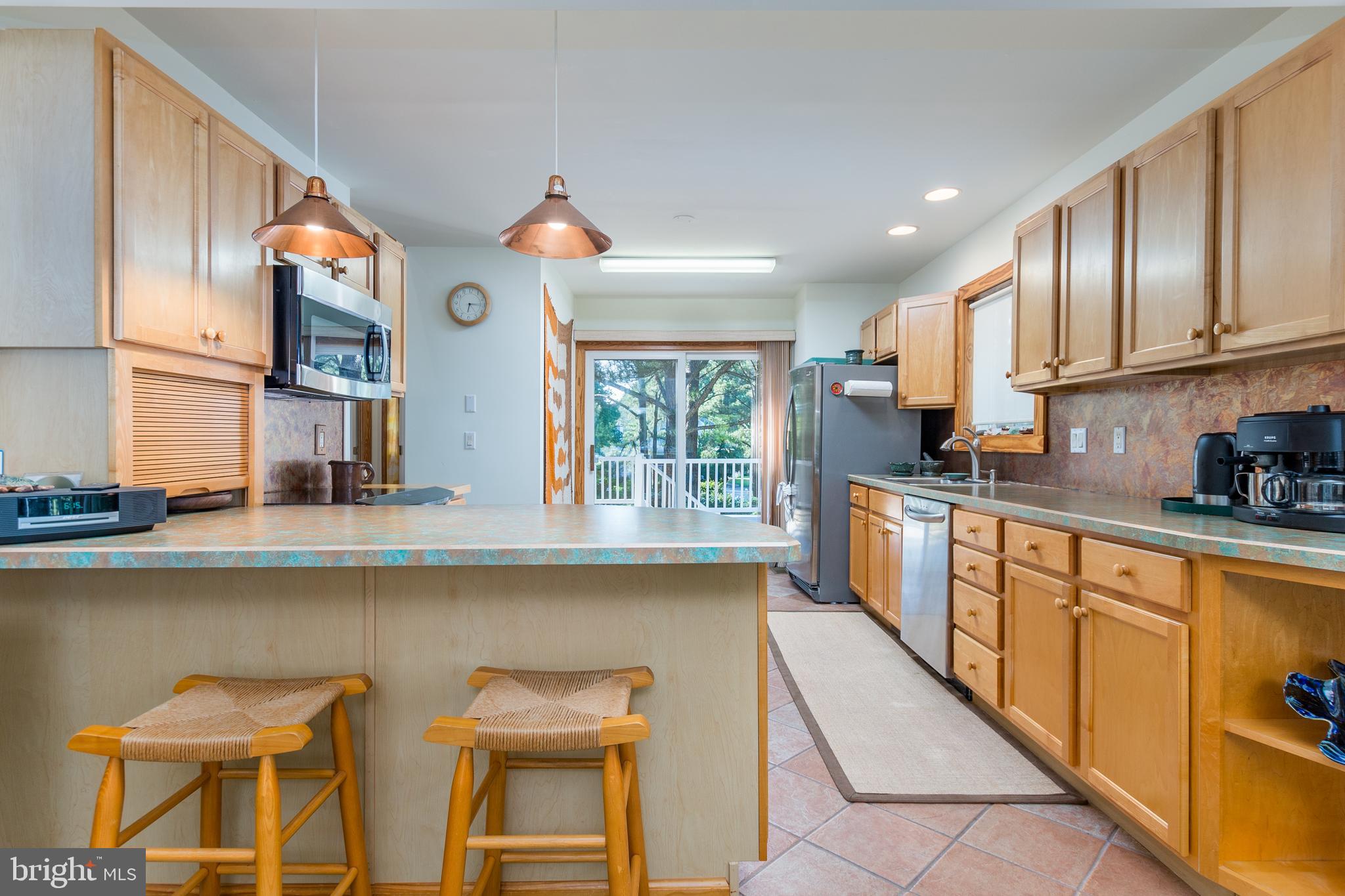 533 Bethany Loop Bethany Beach, DE 19930 - Photo 17 of 44 Well equipped kitchen with breakfast bar
