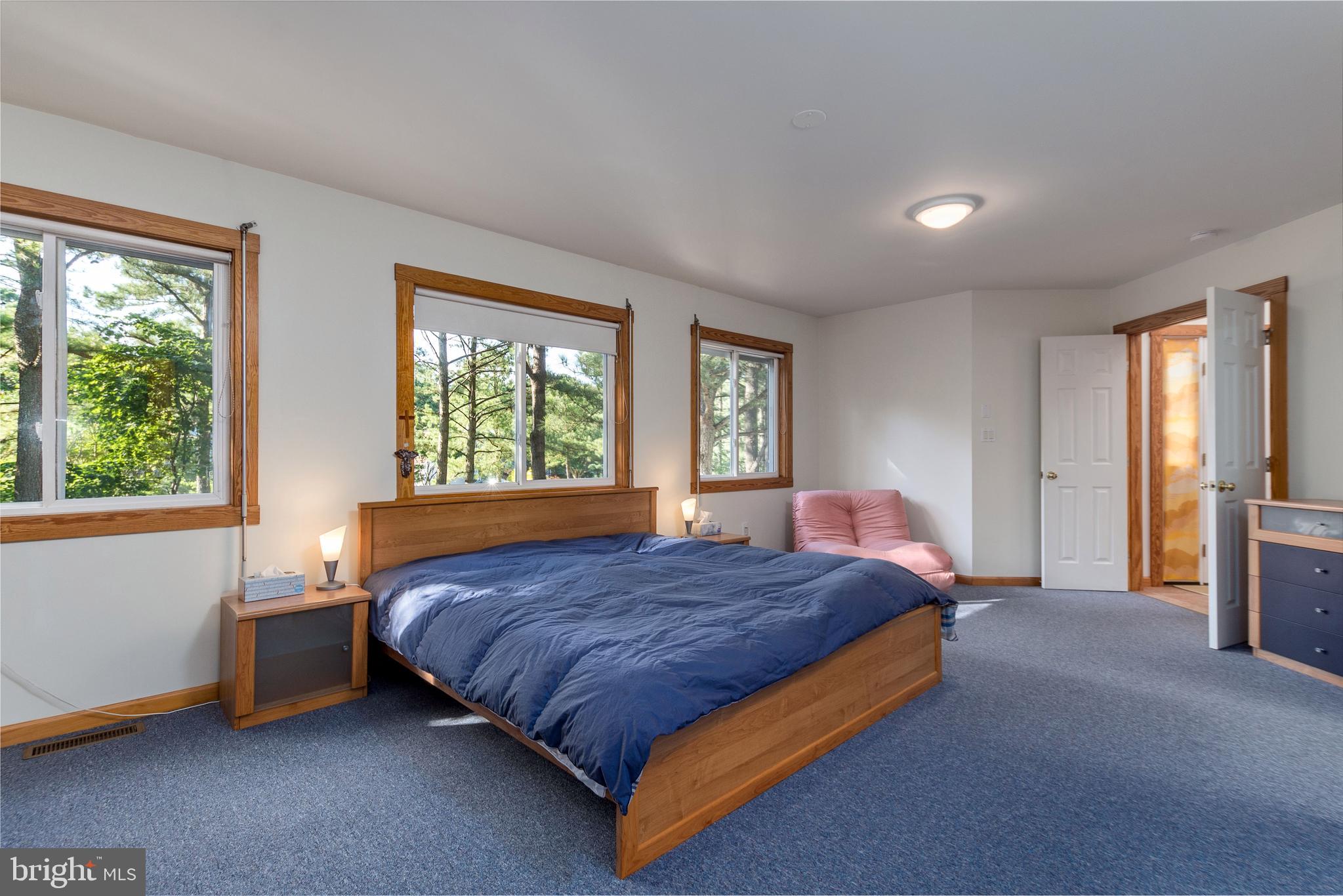 533 Bethany Loop Bethany Beach, DE 19930 - Photo 20 of 44 Master bedroom and en suite situated for privacy