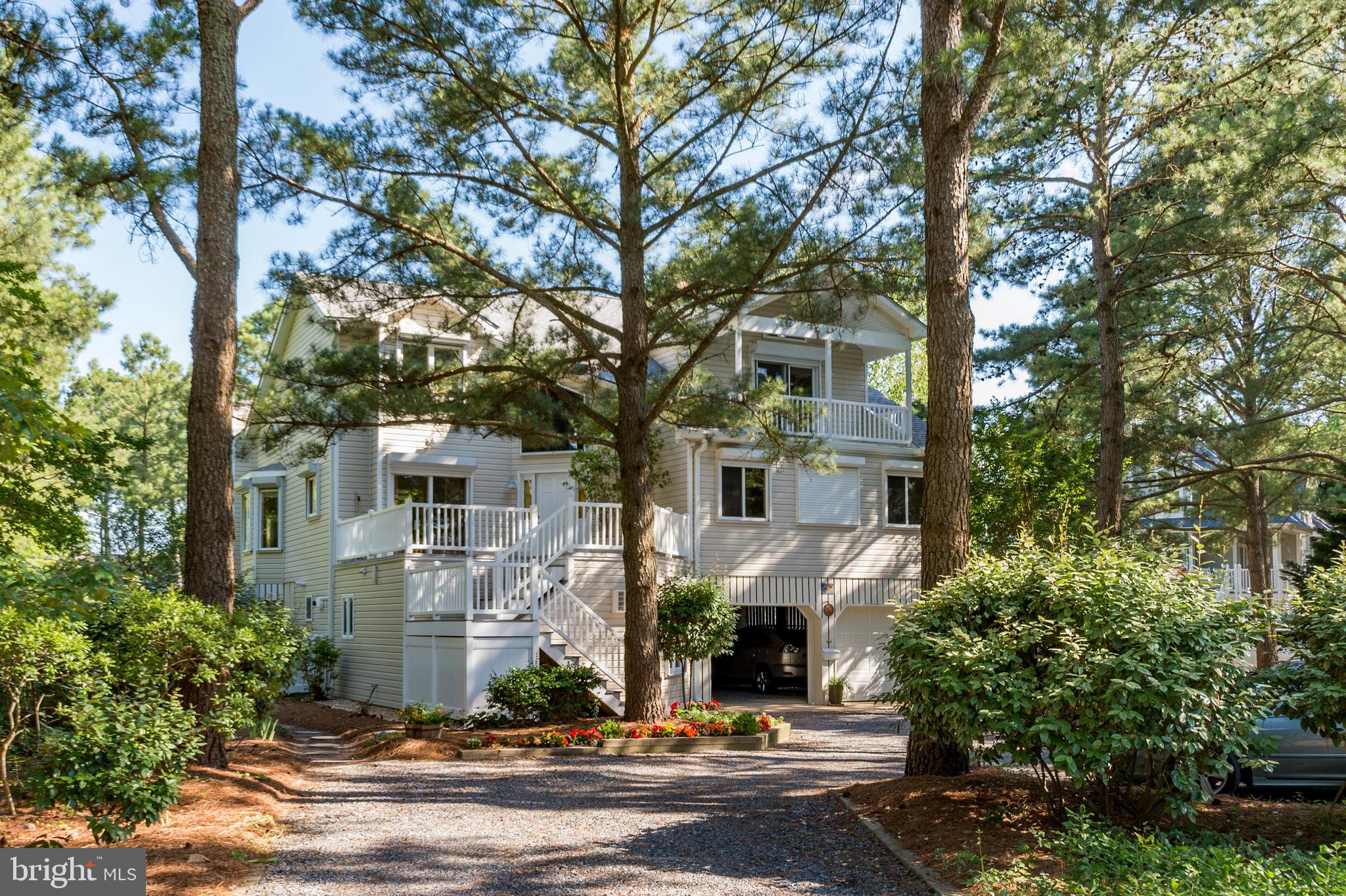 533 Bethany Loop Bethany Beach, DE 19930 - Photo 5 of 44 Space for 2 cars under home & parking for guests