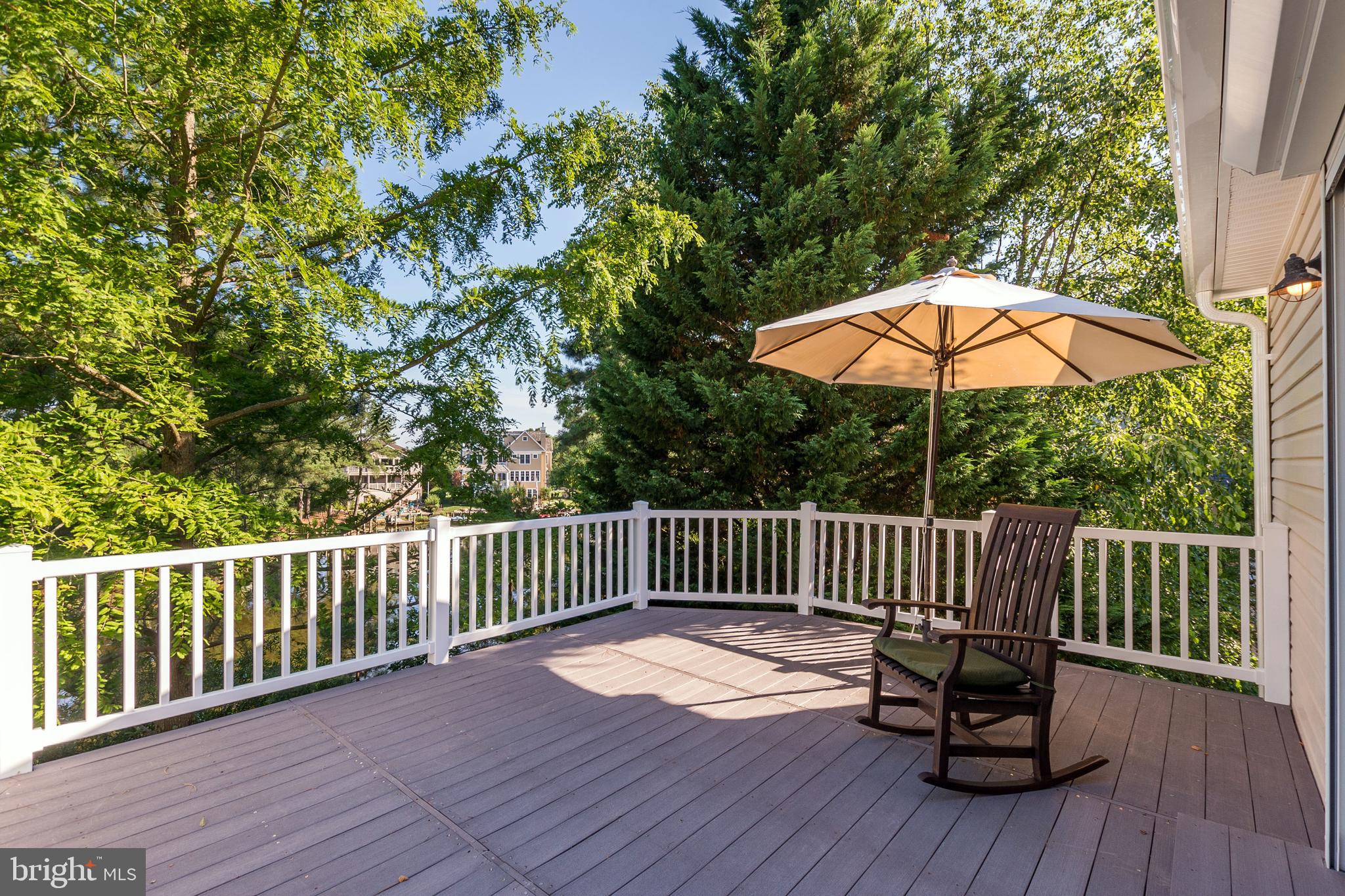 533 Bethany Loop Bethany Beach, DE 19930 - Photo 7 of 44 Upper level deck on pond front
