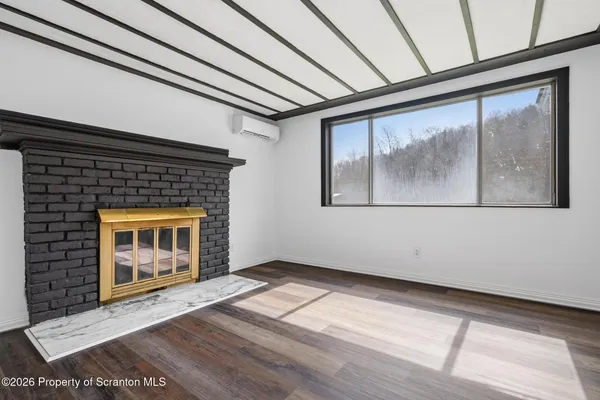 a view of a hallway with a glass door