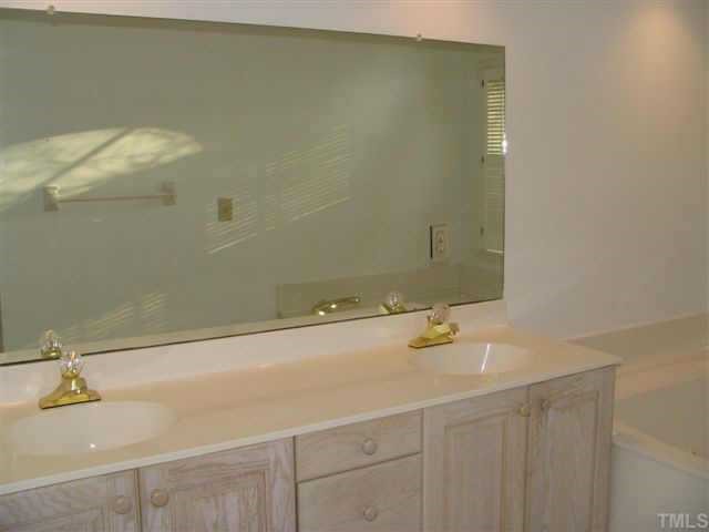 4324 Swarthmore Road Durham, NC 27707 - Photo 6 of 7 convenient double vanity in the master bathroom