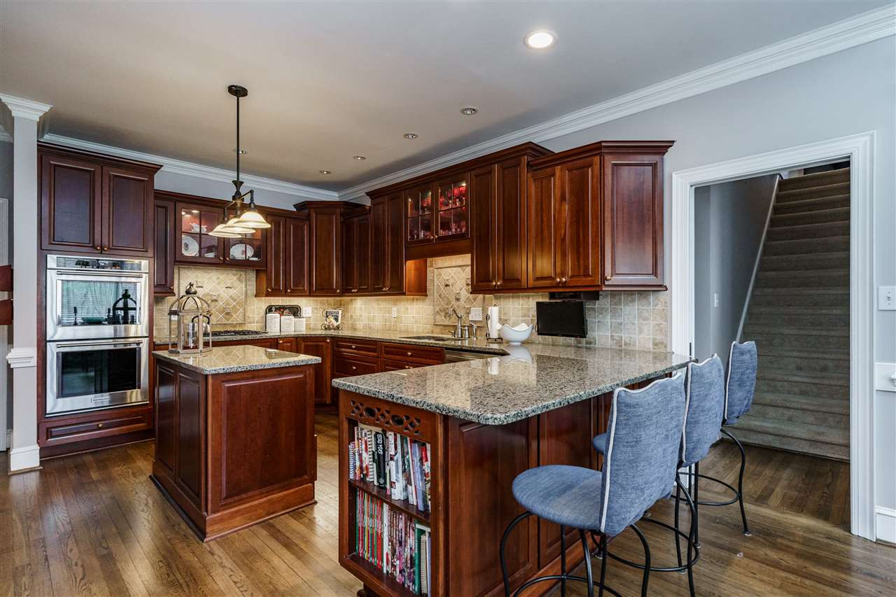 10709 Dunhill Terrace Raleigh, NC 27615 - Photo 13 of 30 Eat in bar for casual meals or a gorgeous breakfast area makes room for more sit down gatherings. Flexible for everyday living! Kitchen