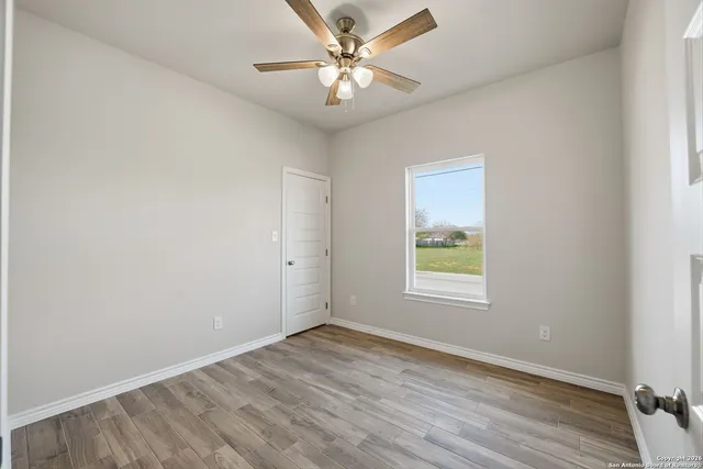 a bathroom with a walk in closet