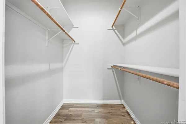a bathroom with a shower and toilet
