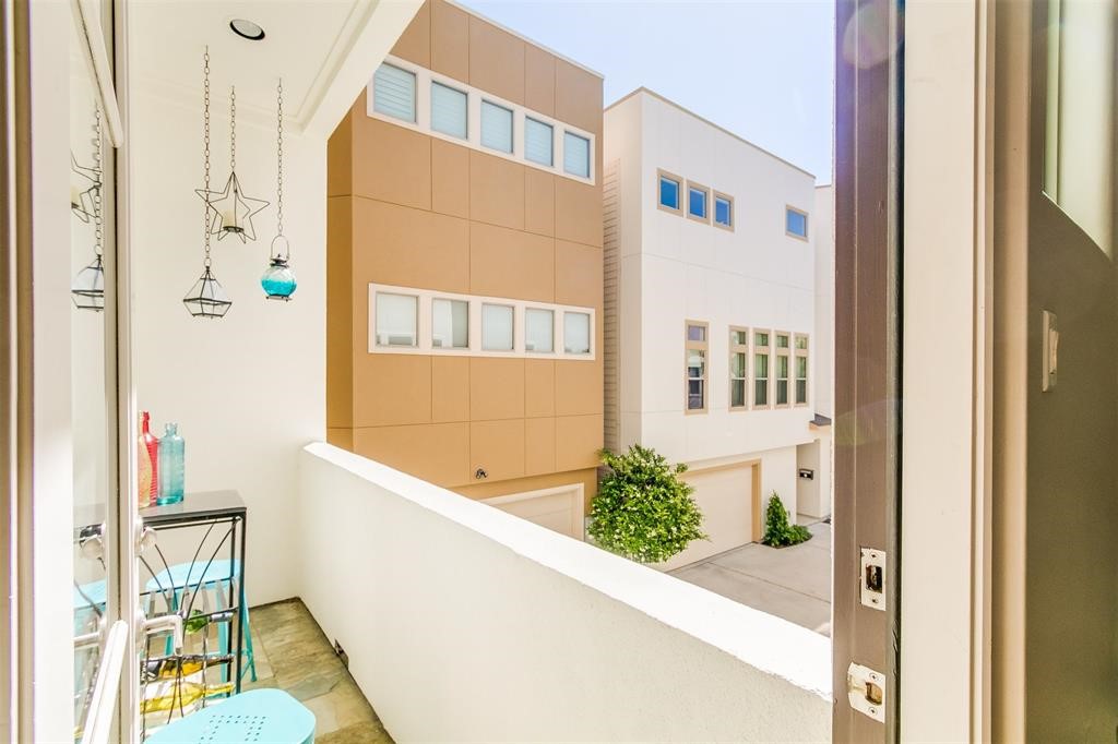 1408 Vermont Street, Unit C Houston, TX 77006 - Photo 14 of 23 a front view of a house with a yard