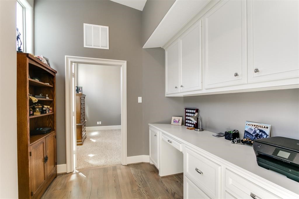 1408 Vermont Street, Unit C Houston, TX 77006 - Photo 15 of 23 a kitchen with a refrigerator and cabinets