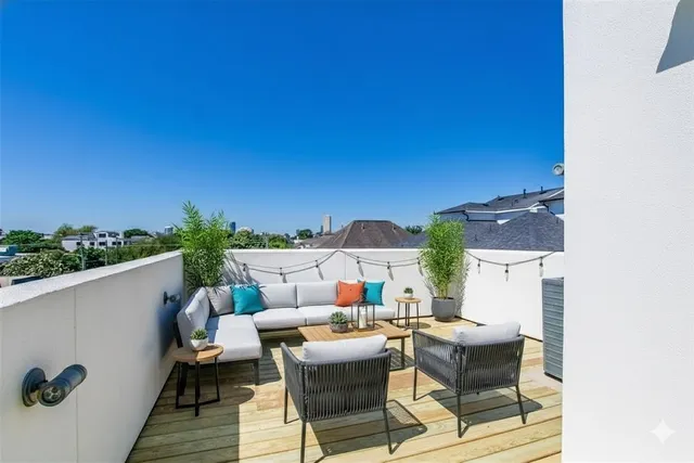 swimming pool view with a seating space
